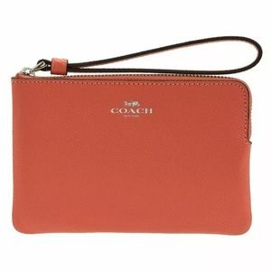 Coral Coach Zip Wristlet